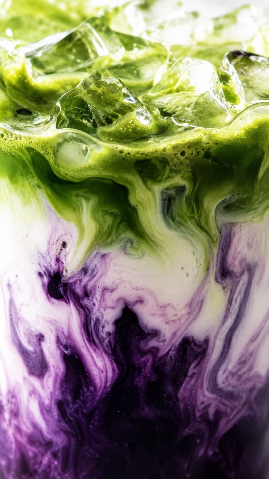 Ube and matcha latte layers, macro shot
